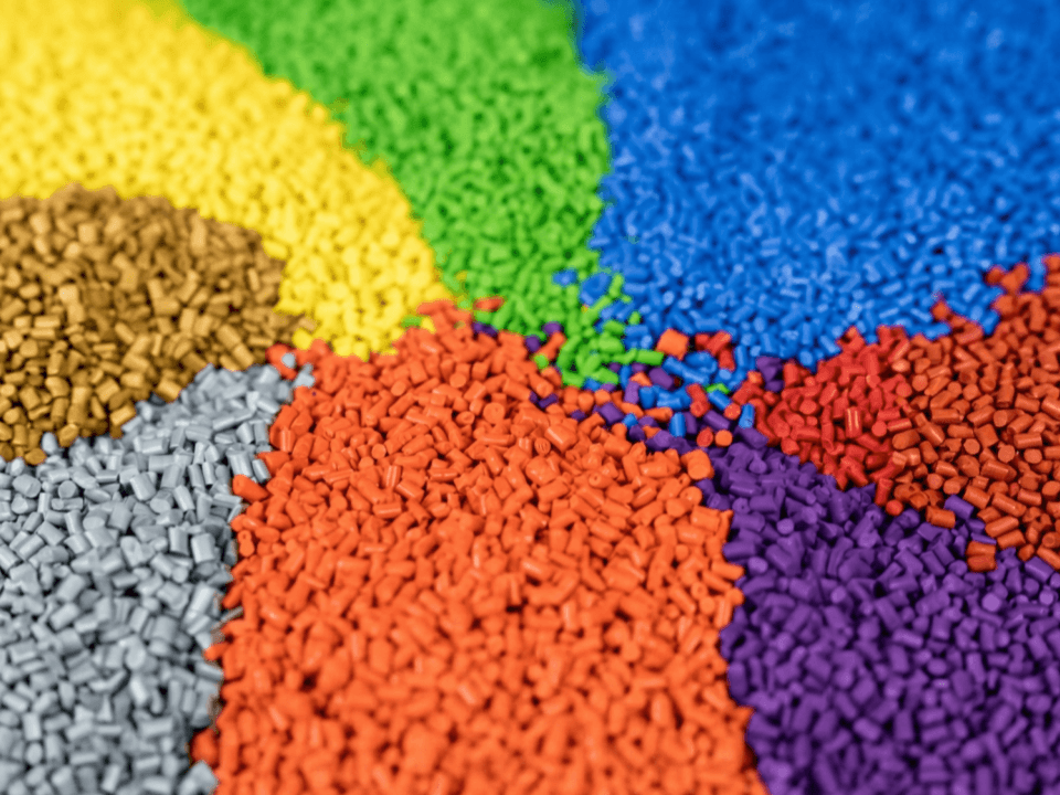 Close up of colorful PLA and PETG 3D printing pellets